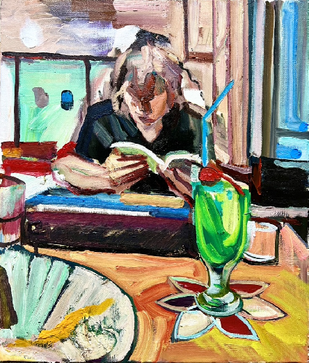 カフェで本を読む人