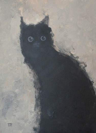 黒猫”キョトン顔”